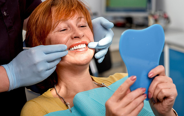 È doloroso fare un impianto dentale?